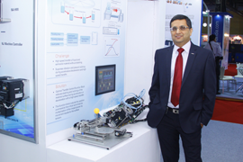 Mr. Sameer Gandhi.MD.Omron Automation India at OMRON booth at Intelpack 2015.