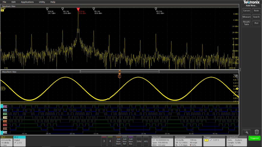 A view of analog waveforms, frequency spectra and digital waveforms.